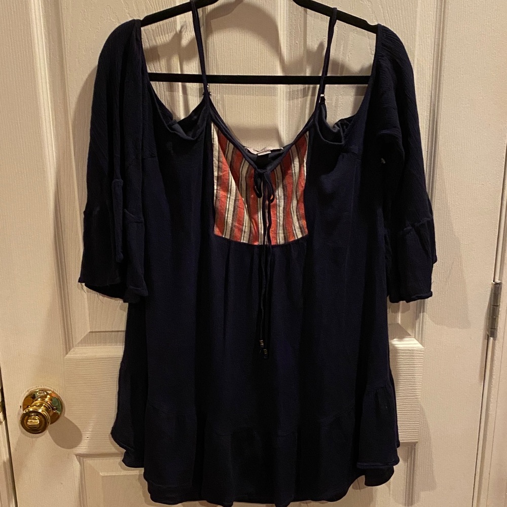 Purple Snow Navy Blouse with Striped Red Detail
A008